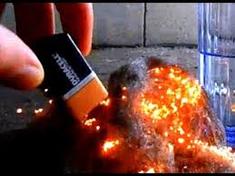 Touch both ends of a battery to steel wool to set it on fire