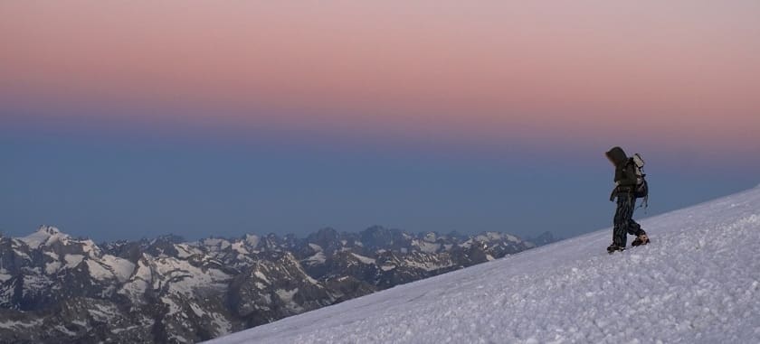 man on snow covered mountain