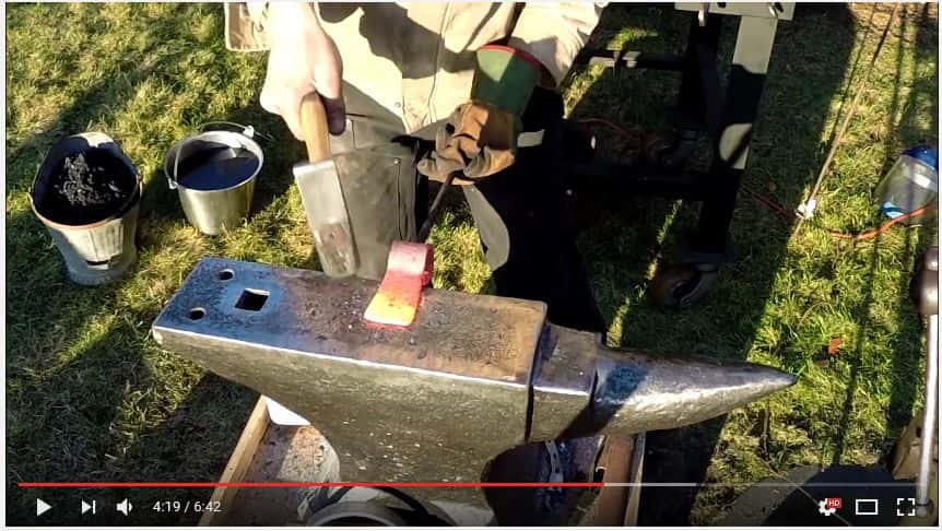 hammering sides of ax