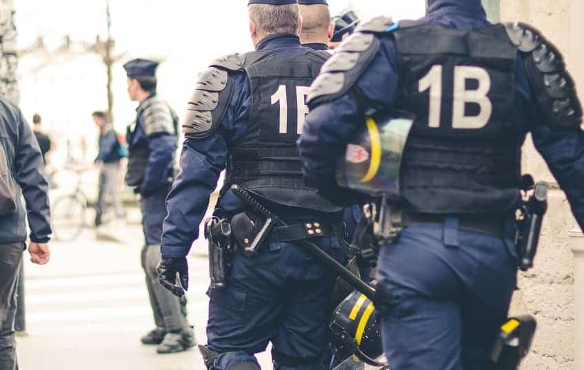 Policemen with batons