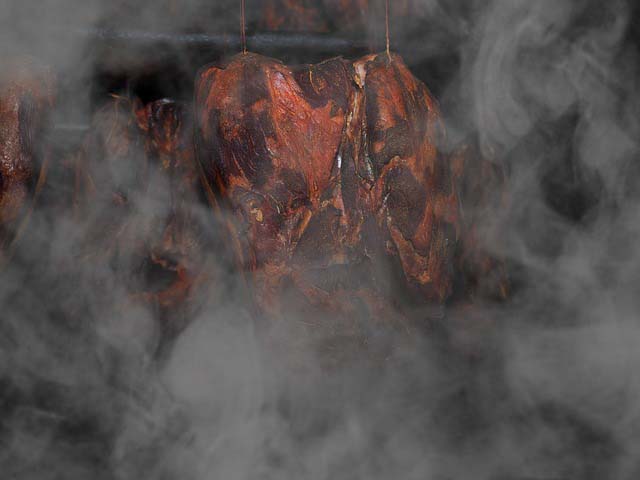 meat in smoker