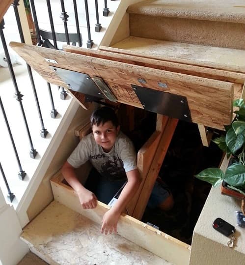 hidden compartment under stairs