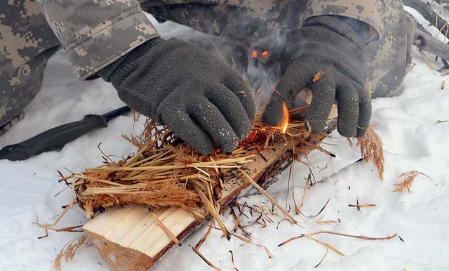 making a fire in the snow