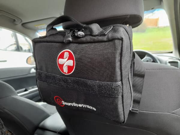 Surviveware Kit on car headrest