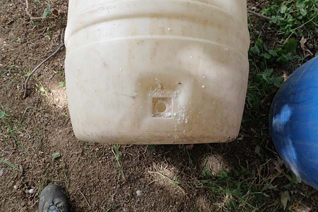 drilling hole in rainwater barrel for spigot