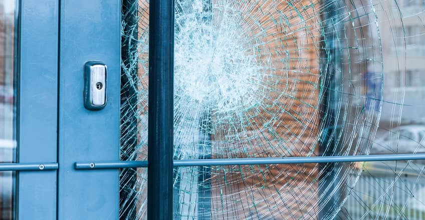 broken door with smashed glass