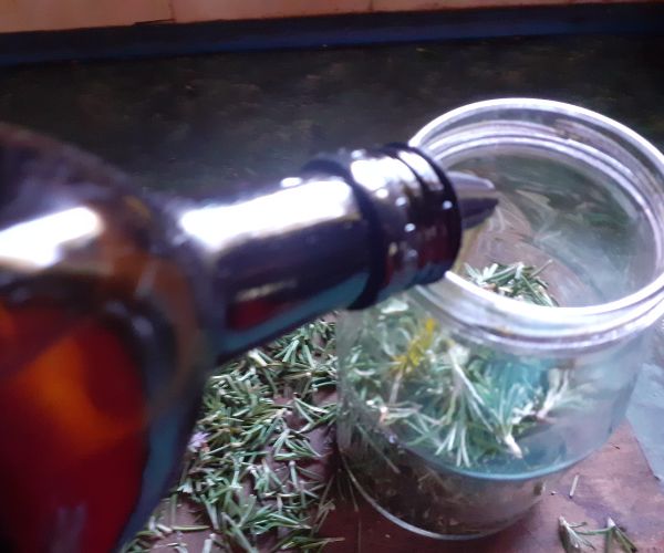 Putting oil in a jar