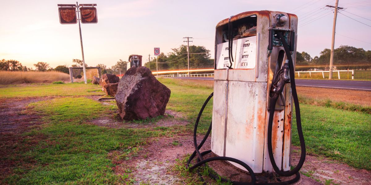 Old rustic pump at an abandoned fuel station