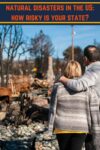 couple standing looking at wreackage after a natural disaster