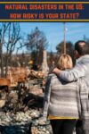 couple standing looking at wreackage after a natural disaster