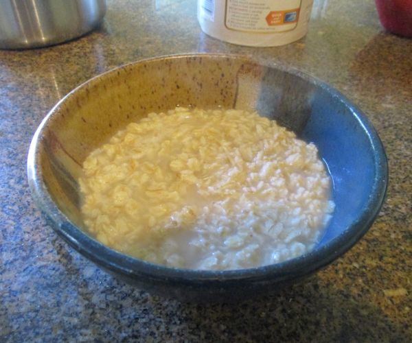 Cooked oatmeal in bowl