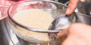 Cook mixes and sieves almond powder in flour